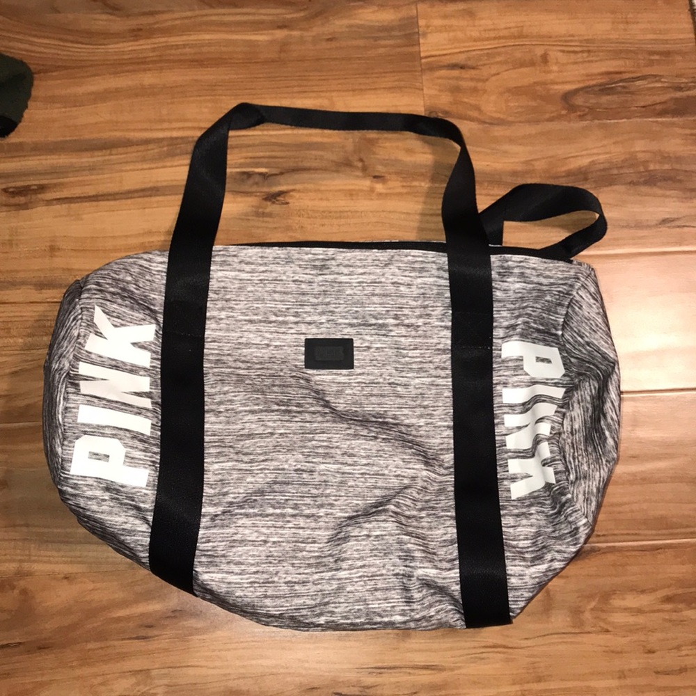 Grey and black small duffel bag